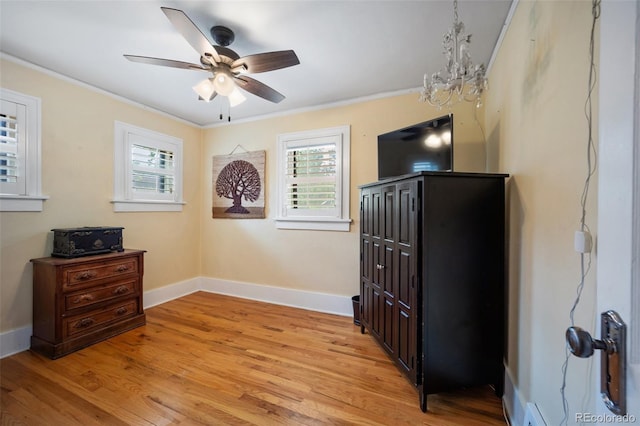 3242 Utica St, Denver, CO 80212 - bedroom featuring light wood finished floors, baseboards, crown molding, and ceiling fan