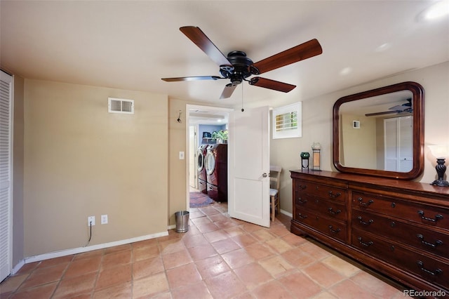 3242 Utica St, Denver, CO 80212 - bedroom featuring independent washer and dryer, baseboards, and a ceiling fan