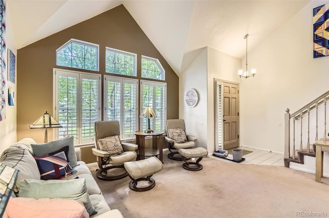2980 W Long Dr Unit E, Littleton, CO 80120 - living room featuring high vaulted ceiling, stairs, a chandelier, and carpet flooring