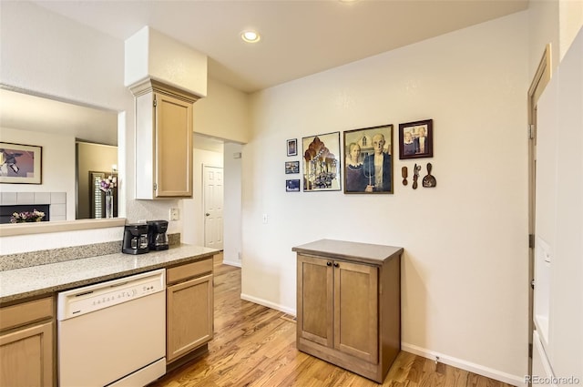 2980 W Long Dr Unit E, Littleton, CO 80120 - kitchen with white dishwasher, light wood-style floors, recessed lighting, and baseboards