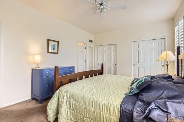 2980 W Long Dr Unit E, Littleton, CO 80120 - carpeted bedroom with multiple closets, baseboards, and a ceiling fan