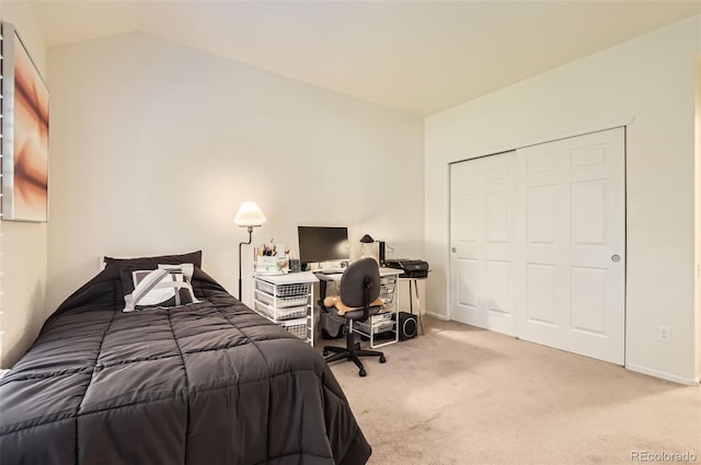 2980 W Long Dr Unit E, Littleton, CO 80120 - carpeted bedroom featuring vaulted ceiling, a closet, and baseboards