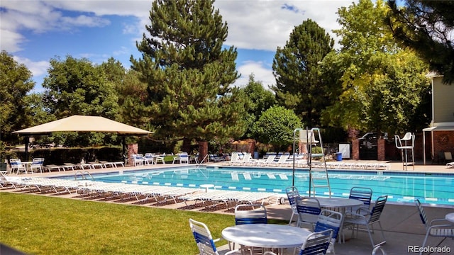 2980 W Long Dr Unit E, Littleton, CO 80120 - community pool featuring a lawn and a patio