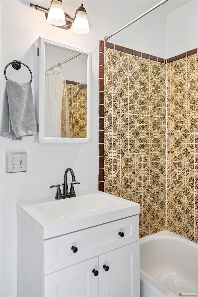 3521 W 40th Ave, Denver, CO 80211 - bathroom with vanity and shower / bath combo with shower curtain