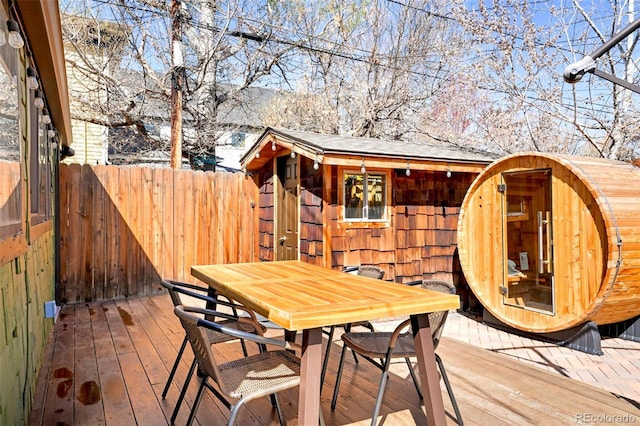 3521 W 40th Ave, Denver, CO 80211 - wooden deck with outdoor dining space and an outdoor structure