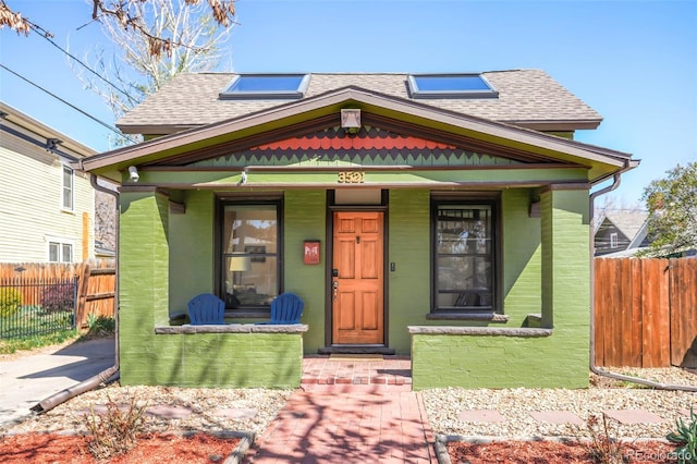 3521 W 40th Ave, Denver, CO 80211 - view of front of house with a shingled roof and a porch