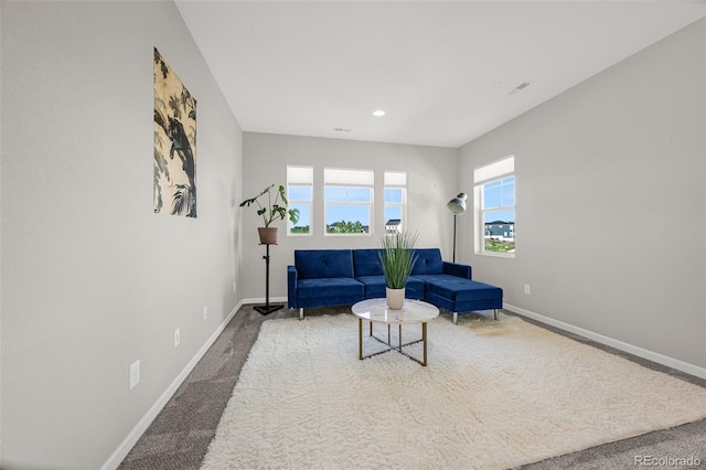 118 N Newcastle Way, Aurora, CO 80018 - living area featuring carpet, baseboards, and recessed lighting