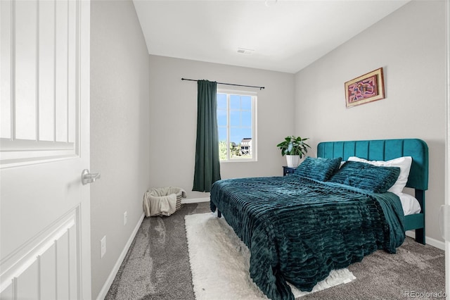 118 N Newcastle Way, Aurora, CO 80018 - carpeted bedroom featuring baseboards
