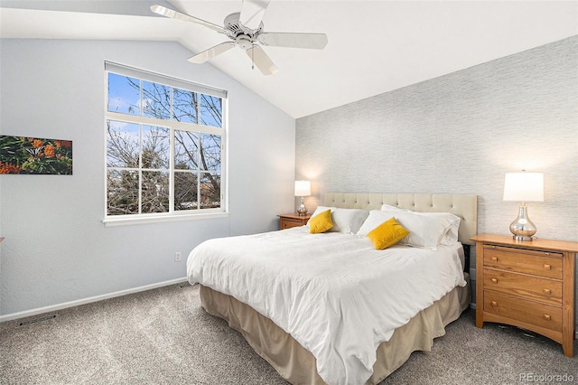 carpeted bedroom with vaulted ceiling and ceiling fan