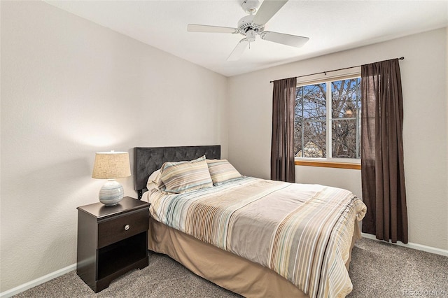 bedroom featuring ceiling fan and carpet