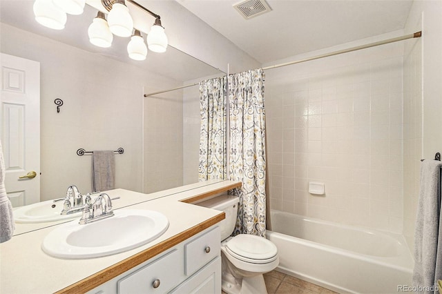 full bathroom with shower / bathtub combination with curtain, vanity, tile patterned floors, and toilet