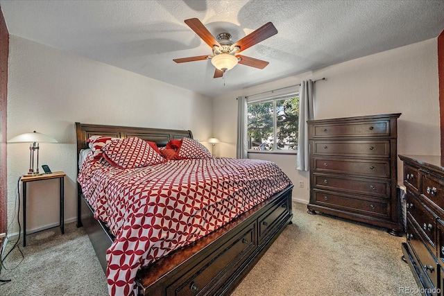 10714 Birch Ct, Thornton, CO 80233 - bedroom featuring light colored carpet, ceiling fan, and a textured ceiling