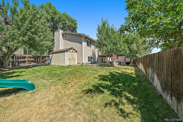 10714 Birch Ct, Thornton, CO 80233 - fenced backyard featuring a storage shed and a playground