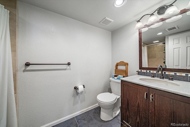 10714 Birch Ct, Thornton, CO 80233 - bathroom featuring vanity, a shower with shower curtain, tile patterned floors, and a textured wall