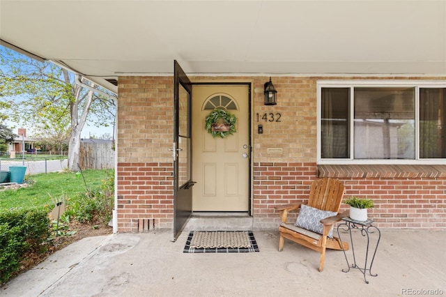 1432 Xanthia St, Denver, CO 80220 - property entrance featuring brick siding