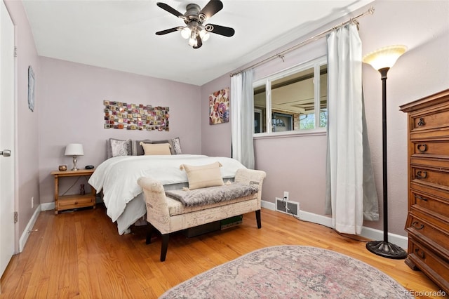 1432 Xanthia St, Denver, CO 80220 - bedroom featuring wood finished floors, baseboards, and a ceiling fan