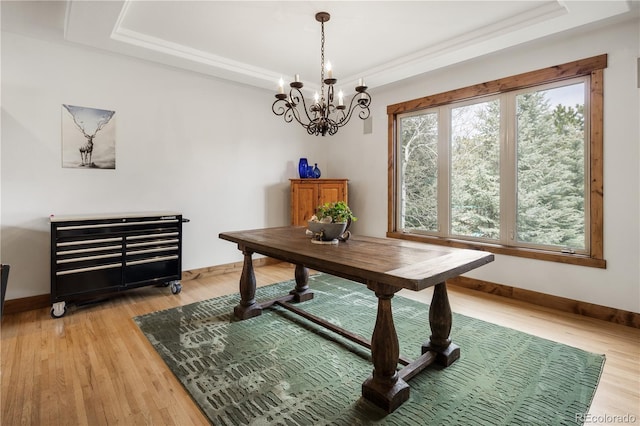 1654 Muirfield Ln, Evergreen, CO 80439 - office space with a tray ceiling, a chandelier, baseboards, and light wood-type flooring