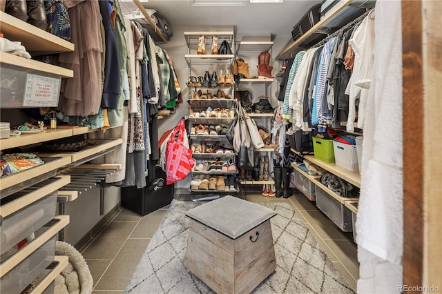 1654 Muirfield Ln, Evergreen, CO 80439 - walk in closet featuring tile patterned flooring