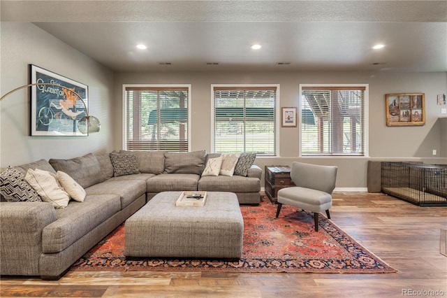 1654 Muirfield Ln, Evergreen, CO 80439 - living area with wood finished floors, recessed lighting, and baseboards