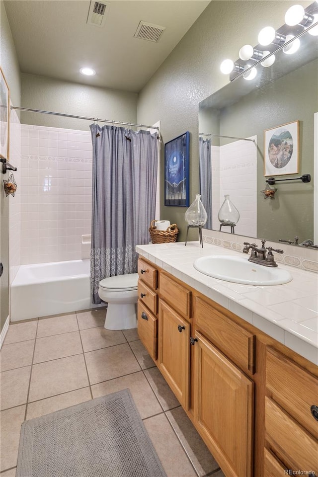 1654 Muirfield Ln, Evergreen, CO 80439 - bathroom with toilet, tile patterned flooring, vanity, and shower / bath combination with curtain