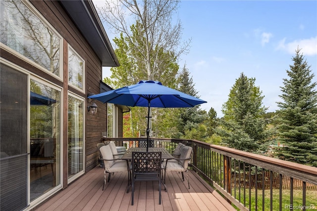 1654 Muirfield Ln, Evergreen, CO 80439 - wooden terrace featuring outdoor dining area