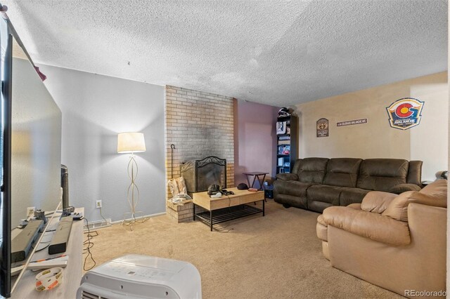 living room with a brick fireplace, carpet floors, and a textured ceiling