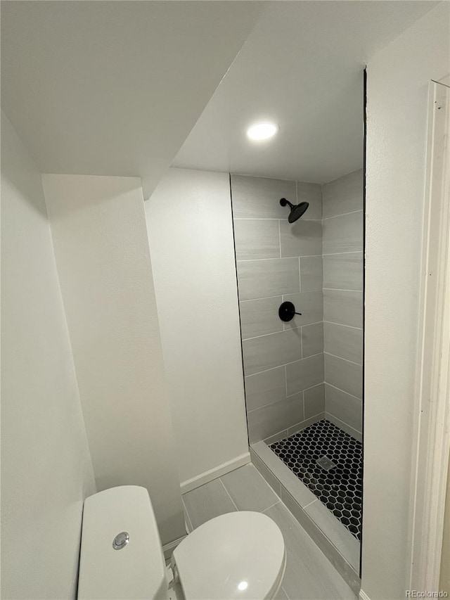 full bath with a shower stall, recessed lighting, and toilet