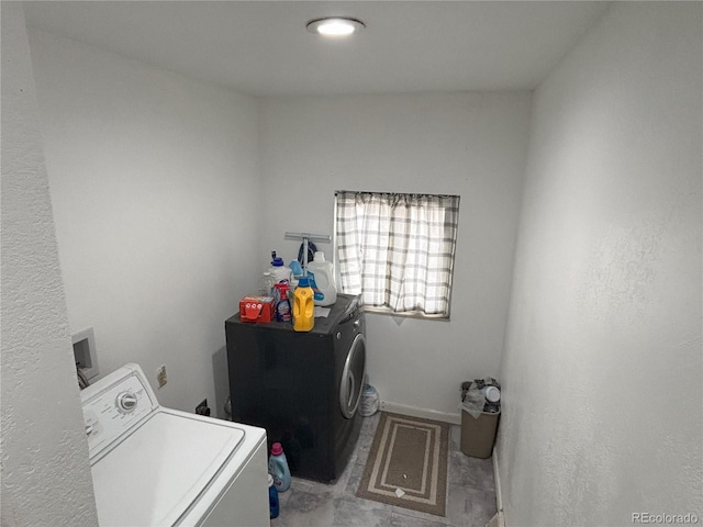 laundry area featuring laundry area and washer / clothes dryer