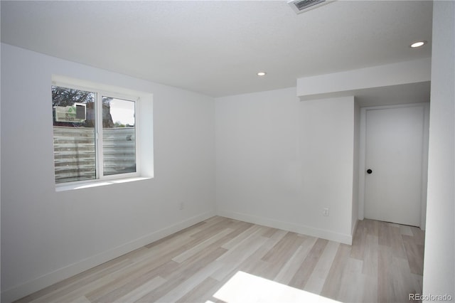 201 Monmouth Ave, Firestone, CO 80520 - spare room with light wood-style flooring, recessed lighting, and baseboards
