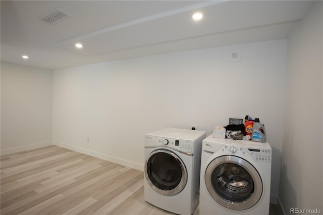 201 Monmouth Ave, Firestone, CO 80520 - laundry room featuring washer and clothes dryer, light wood-style flooring, recessed lighting, and baseboards