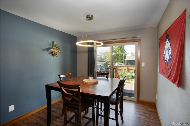201 Monmouth Ave, Firestone, CO 80520 - dining space featuring baseboards and wood finished floors