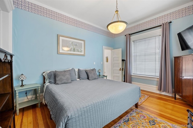 1437 Columbine St, Denver, CO 80206 - bedroom with wood finished floors and baseboards