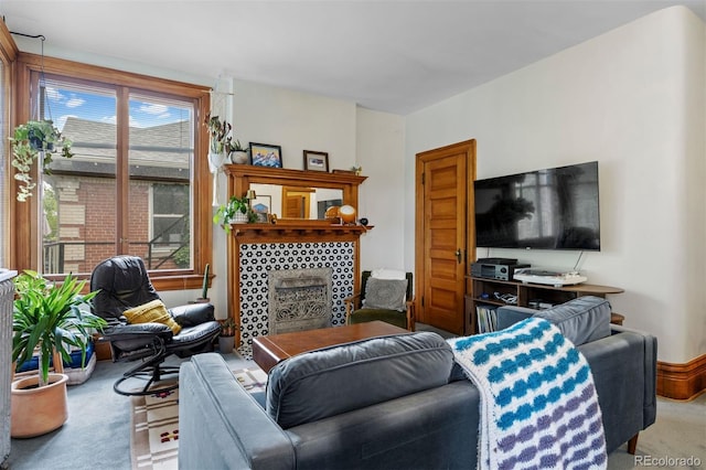 1437 Columbine St, Denver, CO 80206 - carpeted living room with a tiled fireplace