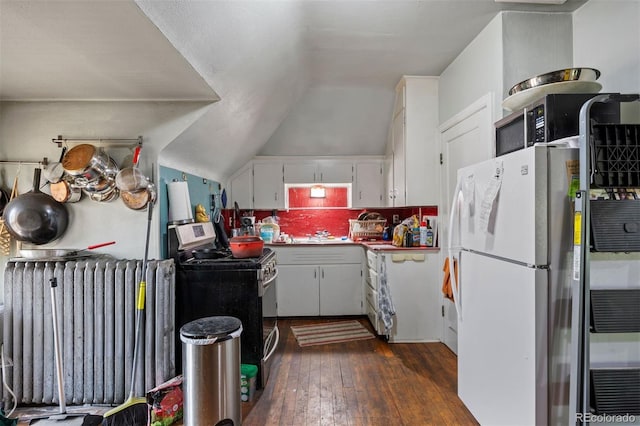 1437 Columbine St, Denver, CO 80206 - kitchen featuring range with gas stovetop, freestanding refrigerator, dark wood-style floors, decorative backsplash, and white cabinets