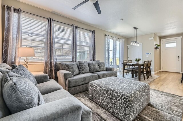 21751 E 7th, Aurora, CO 80018 - living area with light wood-style floors and ceiling fan