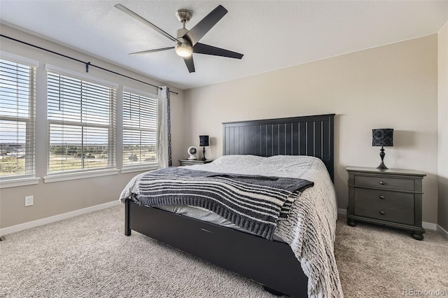 21751 E 7th, Aurora, CO 80018 - carpeted bedroom featuring baseboards and ceiling fan