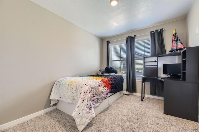 21751 E 7th, Aurora, CO 80018 - bedroom with carpet flooring and baseboards