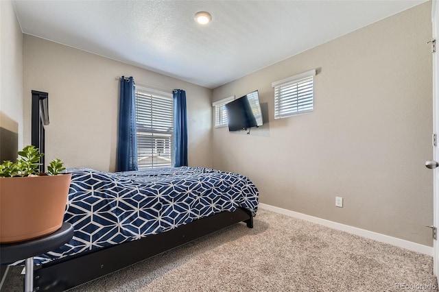 21751 E 7th, Aurora, CO 80018 - carpeted bedroom featuring baseboards