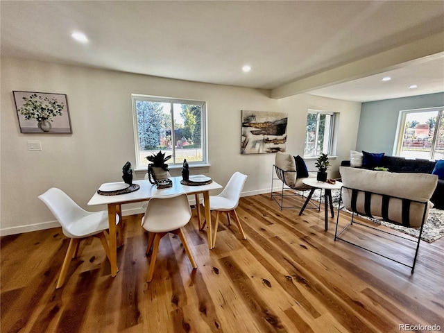601 W Layton Ave, Englewood, CO 80110 - dining area featuring plenty of natural light, wood finished floors, and recessed lighting