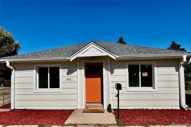 601 W Layton Ave, Englewood, CO 80110 - view of front of home featuring roof with shingles