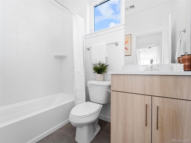 full bathroom featuring shower / tub combo, vanity, toilet, and tile floors