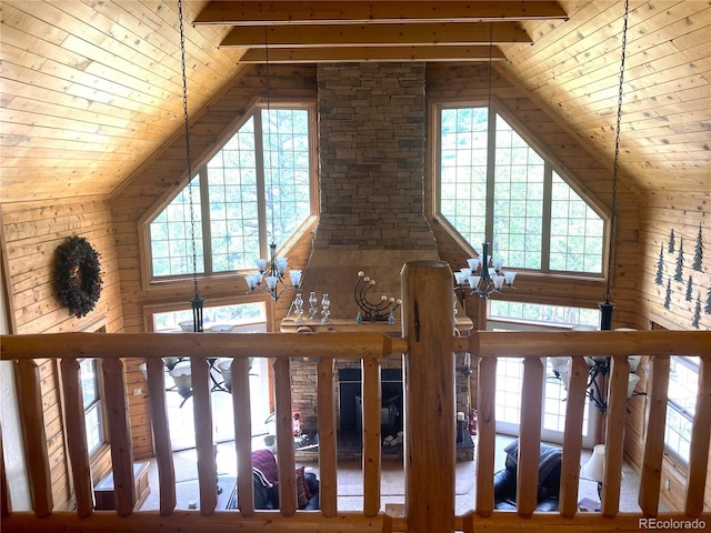 room details with wooden ceiling, a notable chandelier, and beam ceiling