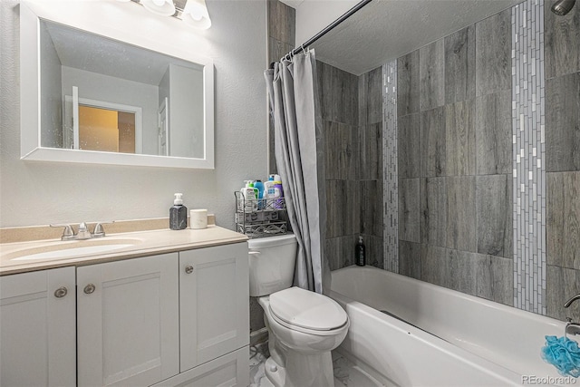 bathroom with a textured wall, toilet, marble finish floor, shower / bath combo with shower curtain, and vanity