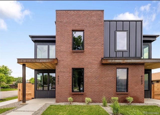 4301 Osceola St, Denver, CO 80212 - view of front of home with board and batten siding and brick siding