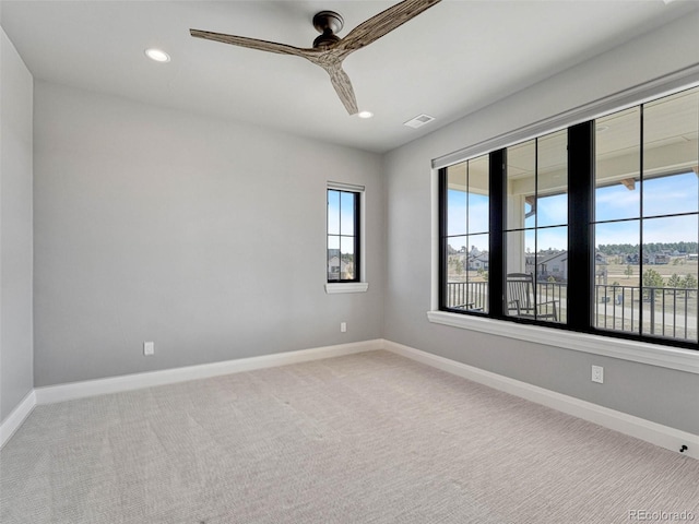 unfurnished room with visible vents, ceiling fan, baseboards, light carpet, and recessed lighting