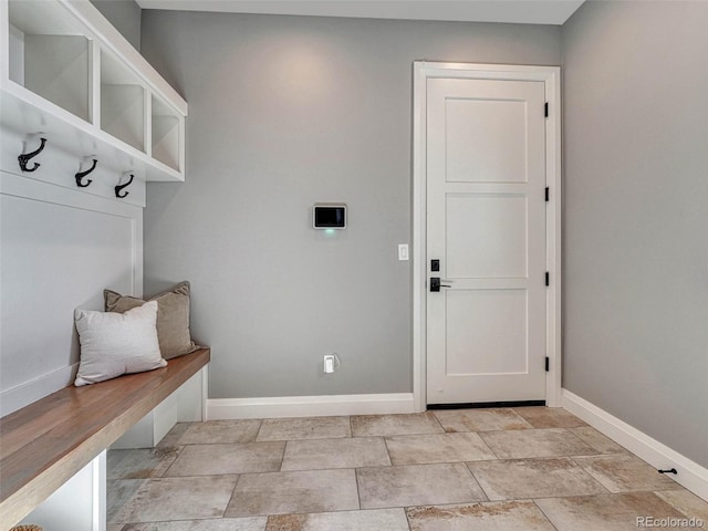 mudroom featuring baseboards