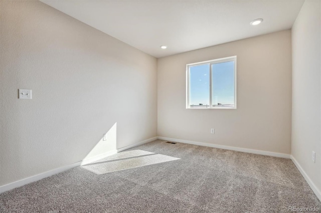 view of carpeted spare room