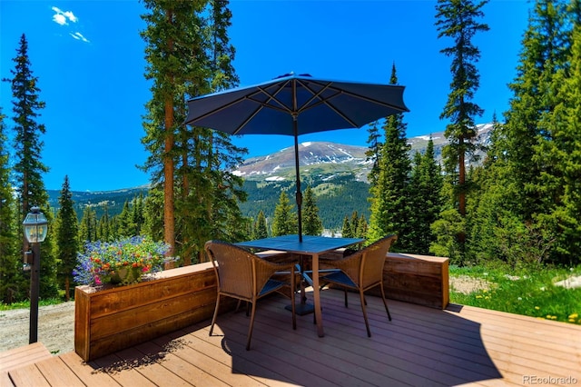 60 Jackson, Alma, CO 80420 - deck featuring a mountain view and outdoor dining area