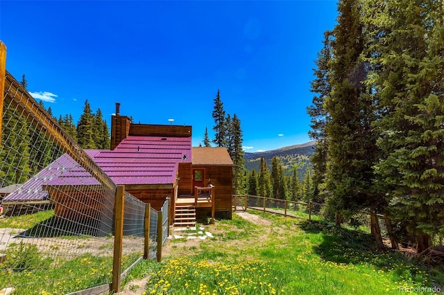 60 Jackson, Alma, CO 80420 - rear view of house with a chimney