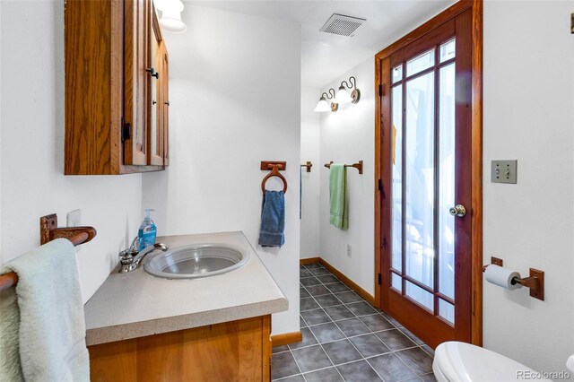 60 Jackson, Alma, CO 80420 - half bath with vanity and tile patterned floors